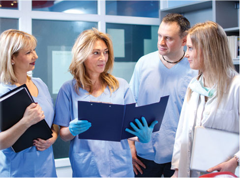 Dentist and assistants